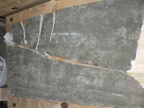 Damaged grave marker, before conservation